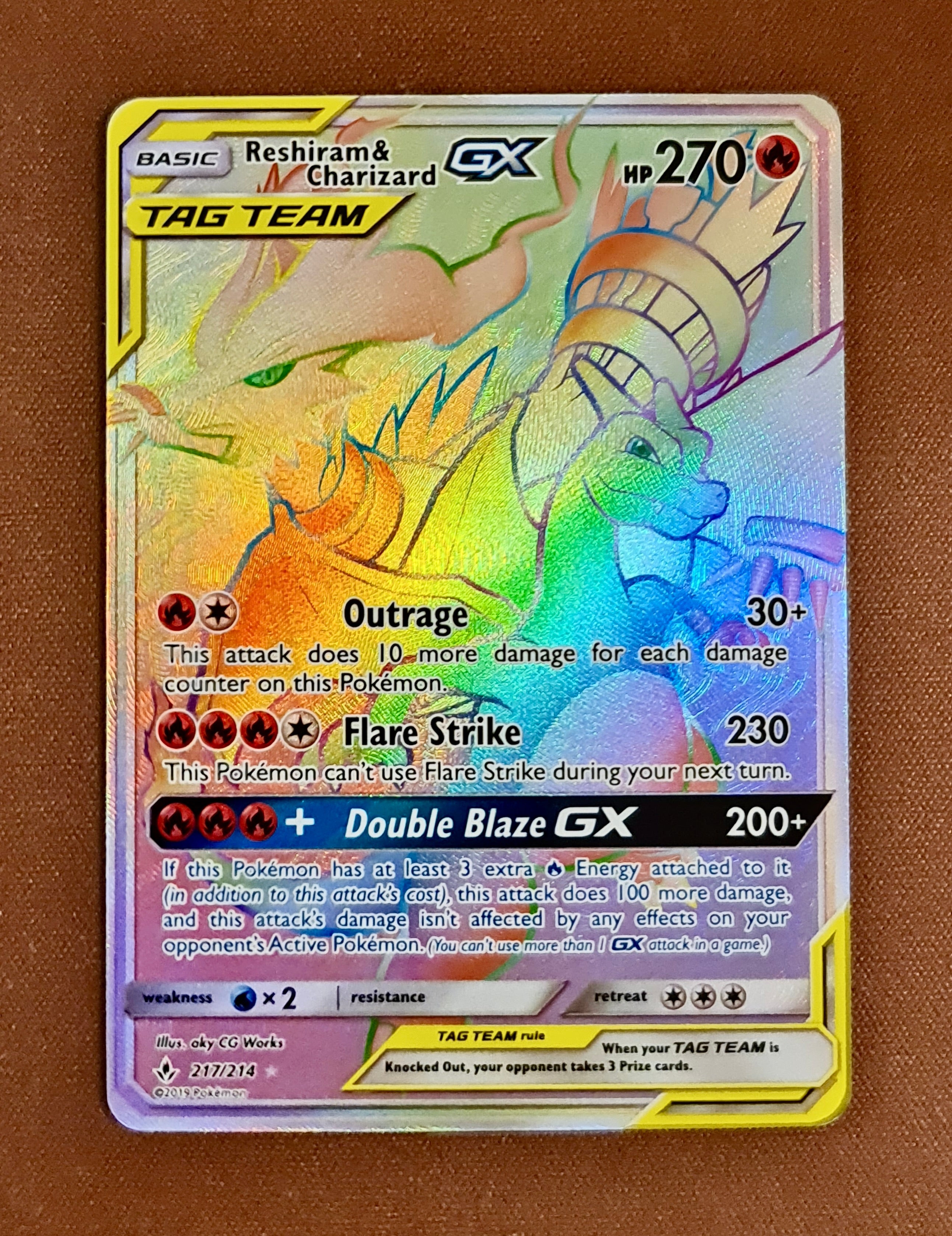 Pokemon Card Unbroken Bonds 217/214 Reshiram & Charizard Tag Team GX Hyper Rare