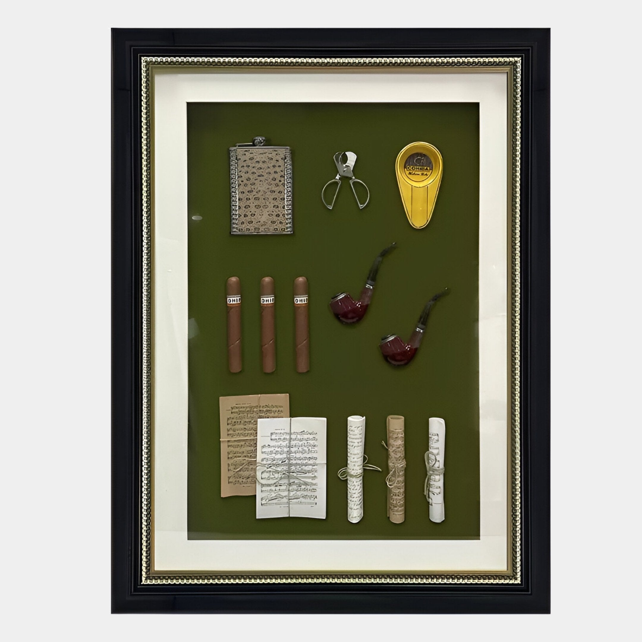 The Valdoro Vintage Cigar & Pipe Framed 3D Wall Art by Giant Sculptures displays a flask, cigar cutter, yellow lighter, cigars, pipes, and papers on a green background—an ideal wall decor piece for cigar and pipe enthusiasts.