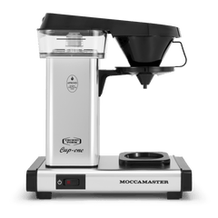 Moccamaster Cup-one Front - silver single cup coffee brewer, with rectangular body and base, clear acrylic water reservoir,  a black removable cup holder, and auto-off power switch