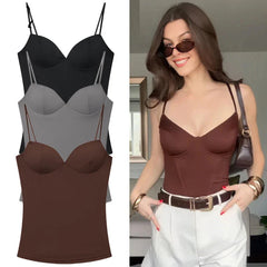 Three spandex tank tops in black, gray, and brown with a model wearing a brown tank top.