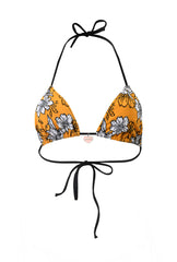 Photo détourée sur fond blanc du haut de maillot de bain Talita à fleur jaune.